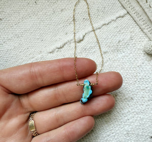 Small Turquoise Woman